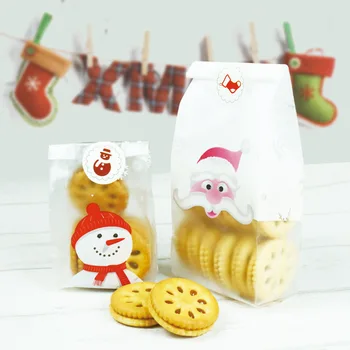 24 adet / grup 2 boyutu Noel Baba ve Noel kardan adam plastik poşetler ambalaj poşetleri torbalar sarmalayıcılar cupcake