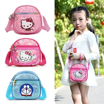 Hello Kitty askılı çanta omuz çantaları Doraemon bozuk para cüzdanı Kawaii Anime Mini kadın Çantası doğum günü hediyesi